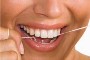 روش درست نخ دندان کشیدن